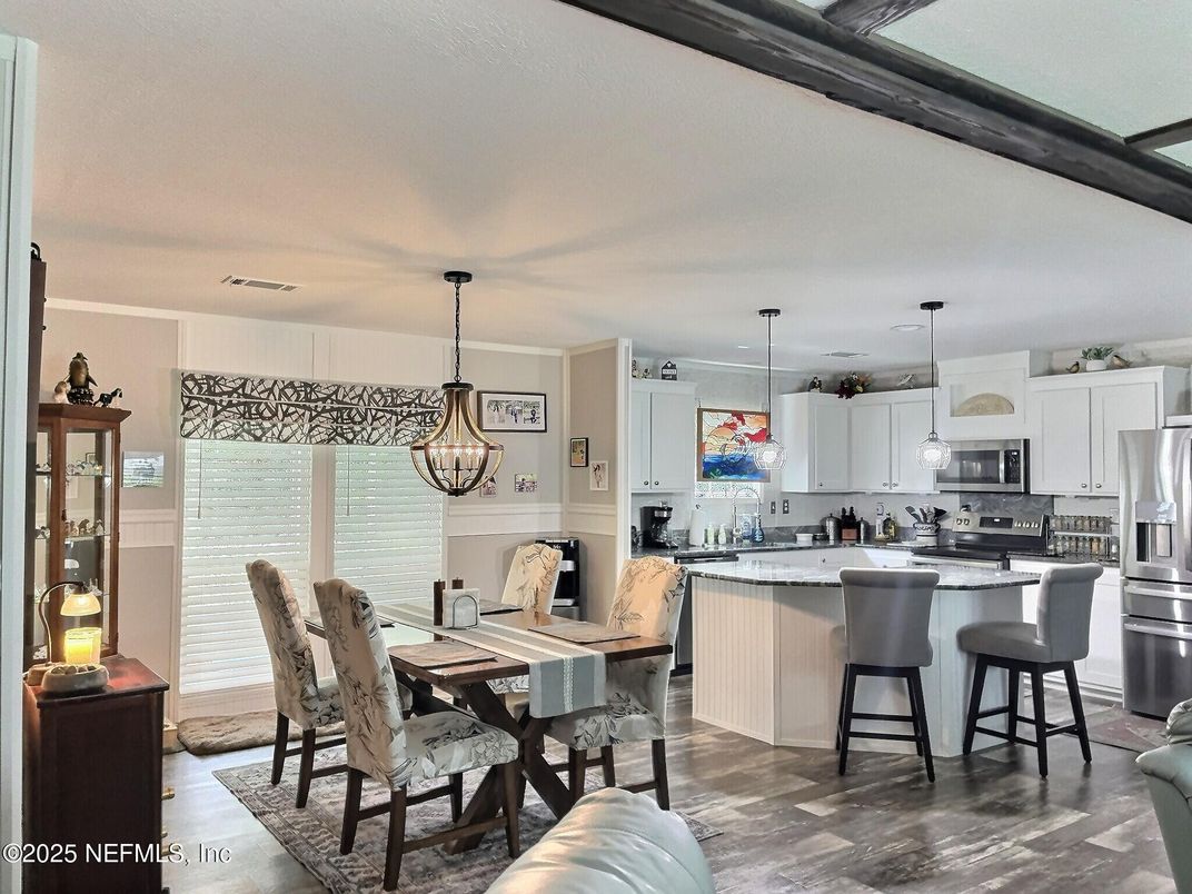 Dining room, Interior, Kitchen, Pendant Lights, Recessed Lighting, Stainless Steel Appliances, Wood Texture Flooring