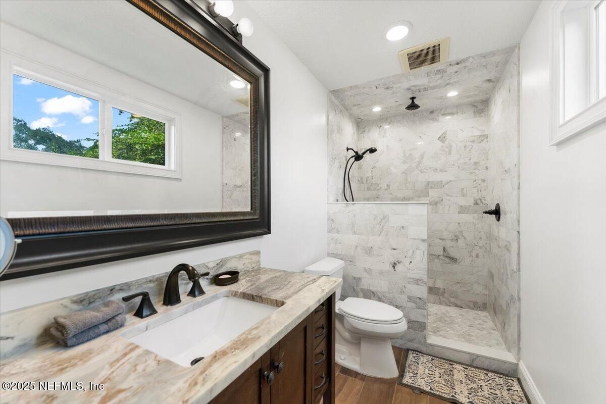 Bathroom, Glass Shower, Interior, Marble Walls, Recessed Lighting, Wood Texture Flooring