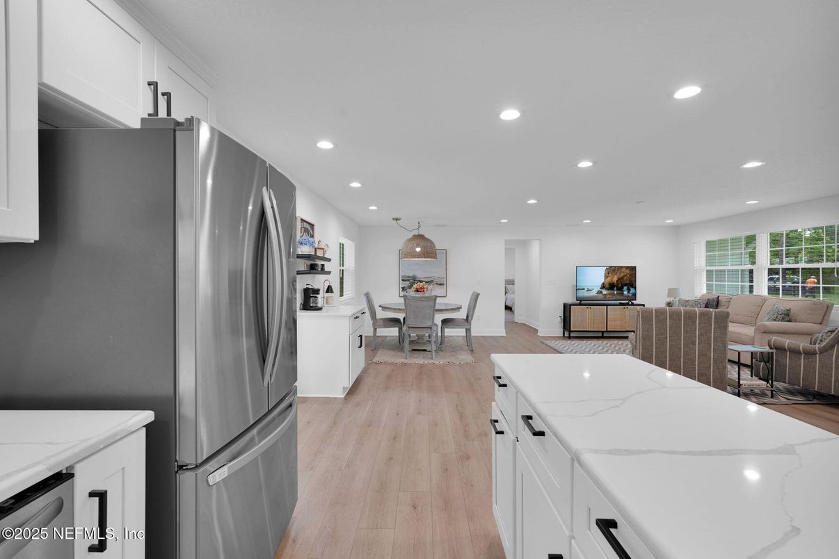 Dining room, Interior, Kitchen, Living room, Pendant Lights, Recessed Lighting, Stainless Steel Appliances, Wood Texture Flooring