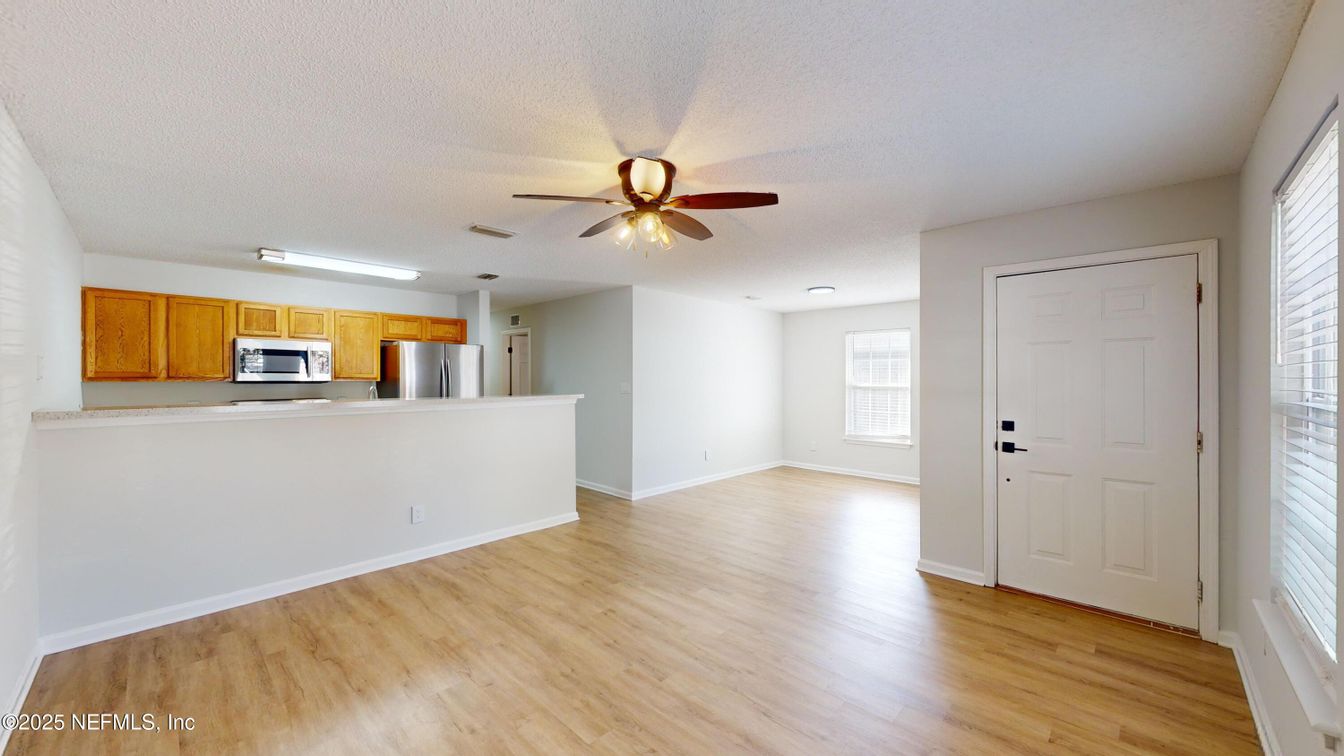 Empty room, Interior, Kitchen, Stainless Steel Appliances, Wood Texture Flooring