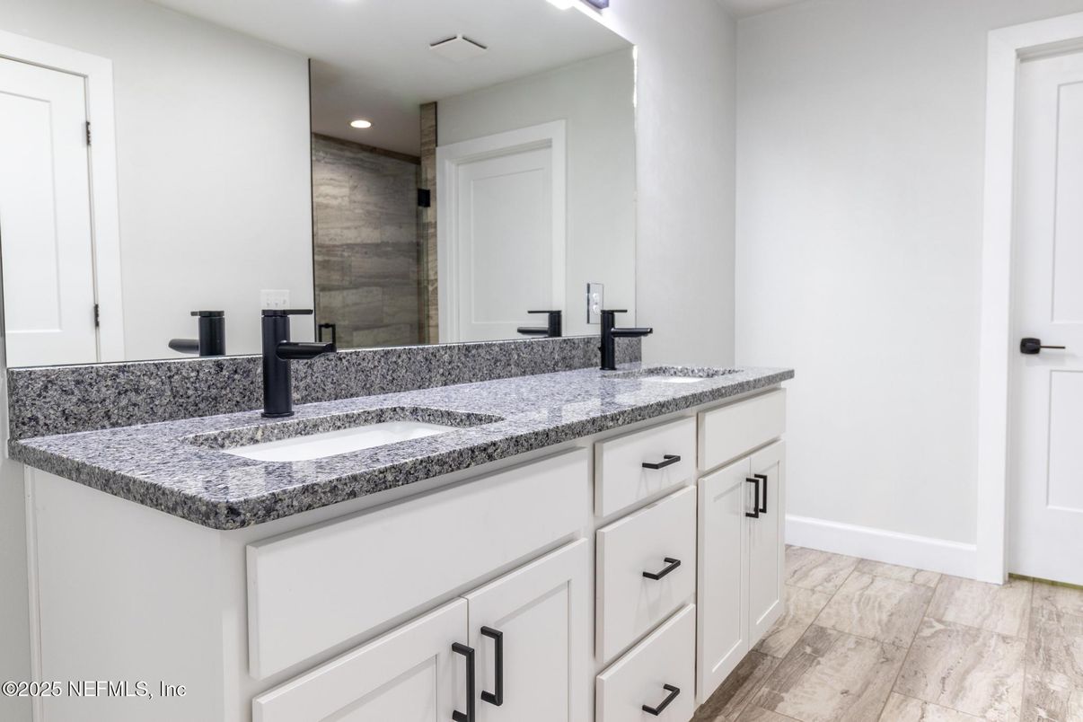 Bathroom, Dual Sink Vanities, Interior, Recessed Lighting, Wood Texture Flooring