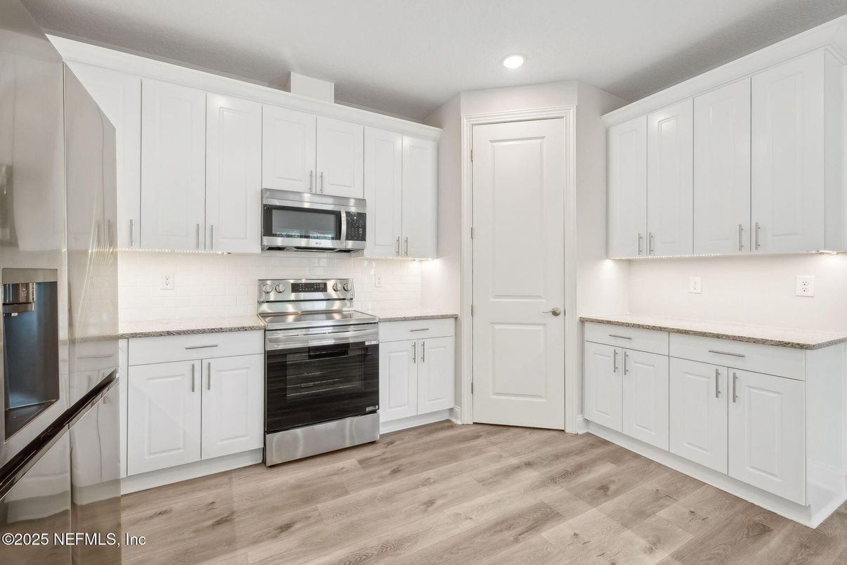 Interior, Kitchen, Recessed Lighting, Stainless Steel Appliances, Wood Texture Flooring