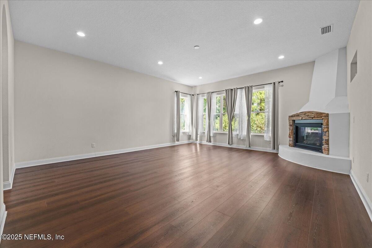 Empty room, Fireplace, Interior, Recessed Lighting, Wood Texture Flooring