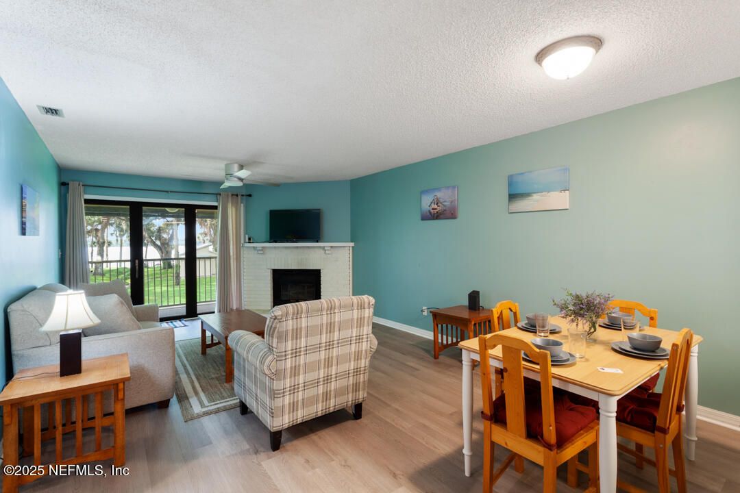 Dining room, Fireplace, Interior, Living room, Wood Texture Flooring