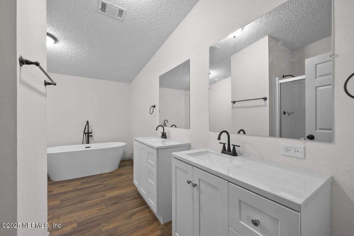 Bathroom, Dual Sink Vanities, Free Standing Baths, Interior, Wood Texture Flooring