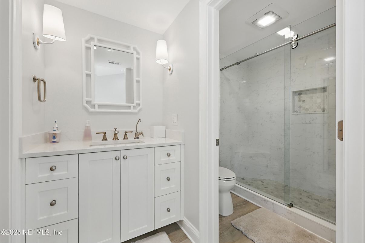 Bathroom, Glass Shower, Interior, Marble Walls, Wood Texture Flooring