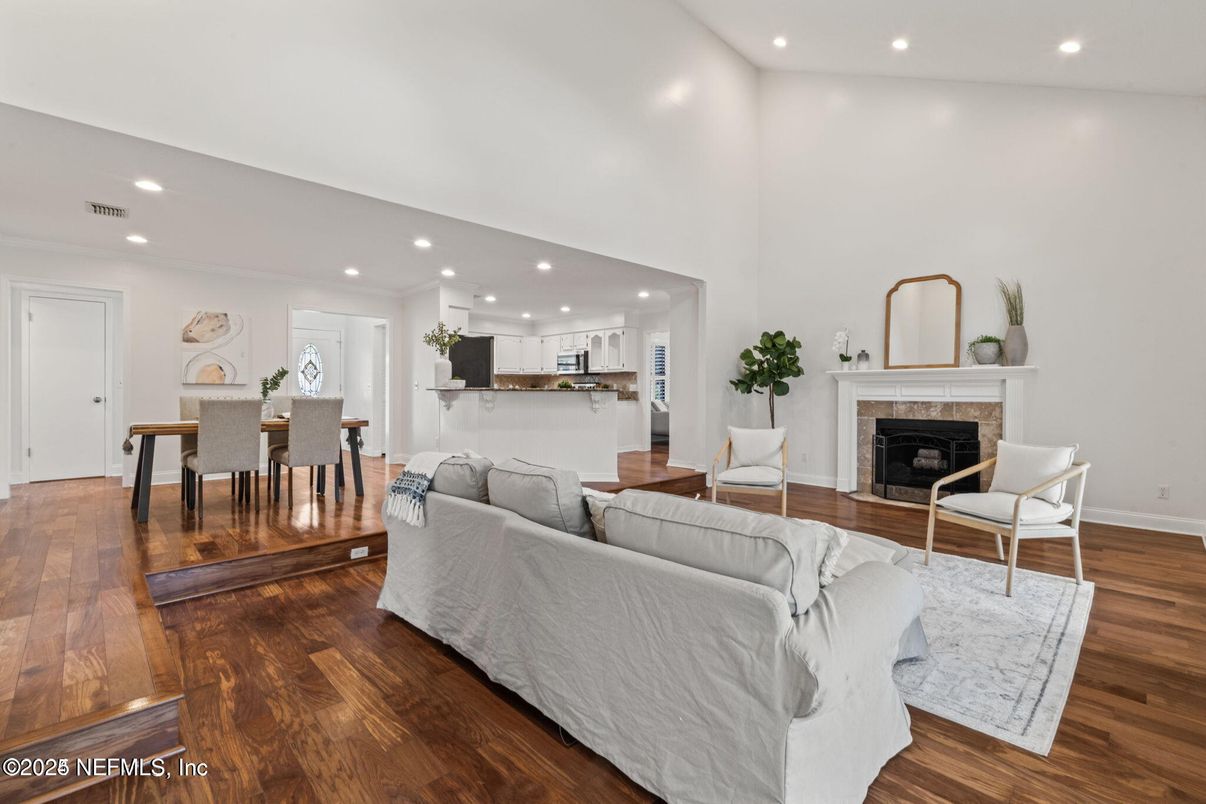 Dining room, Fireplace, Interior, Kitchen, Living room, Recessed Lighting, Wood Texture Flooring