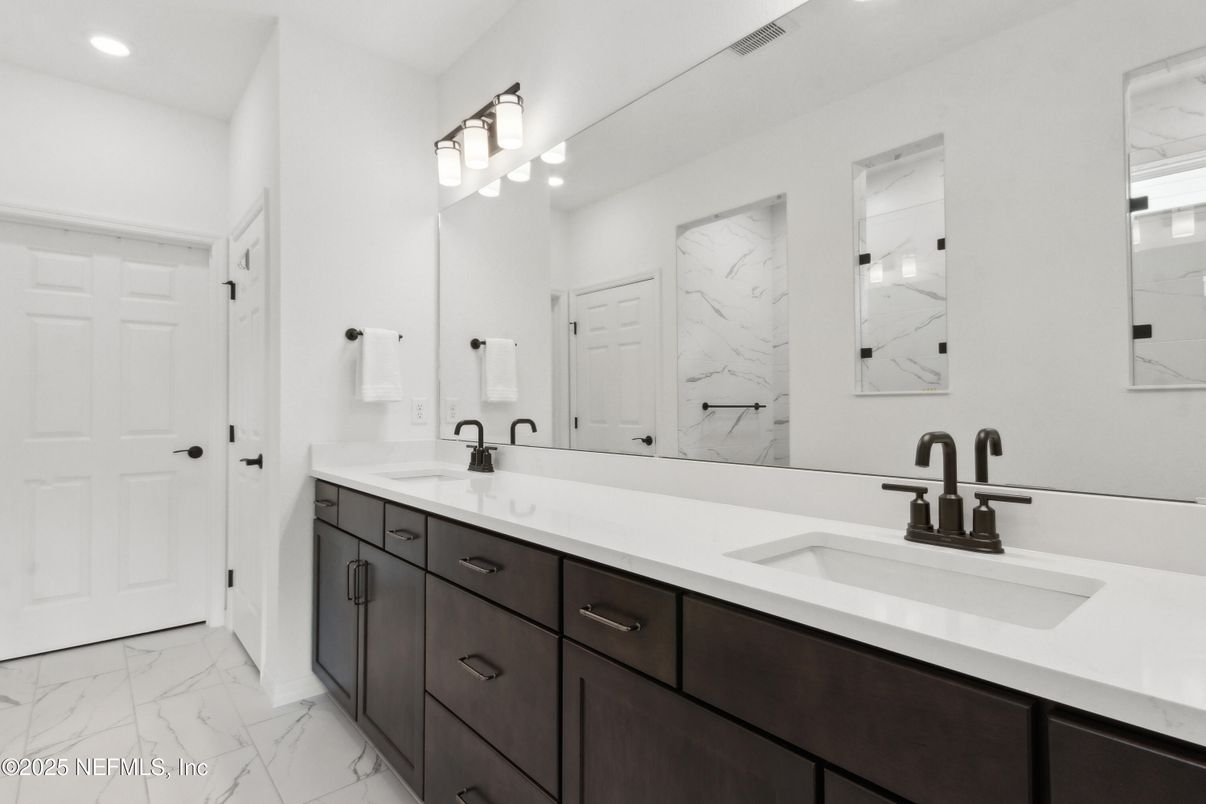 Bathroom, Dual Sink Vanities, Interior, Marble, Marble Walls, Recessed Lighting