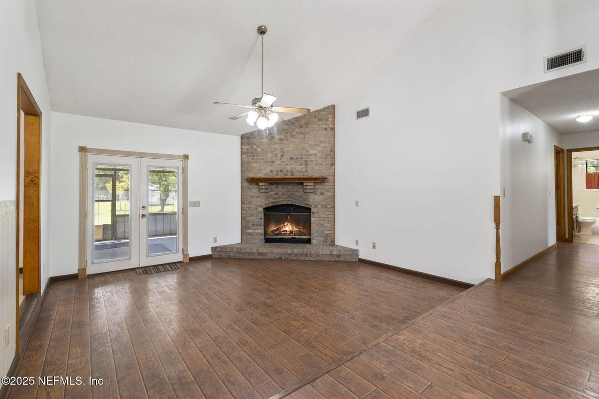 Empty room, Fireplace, Interior, Stone Walls, Wood Texture Flooring