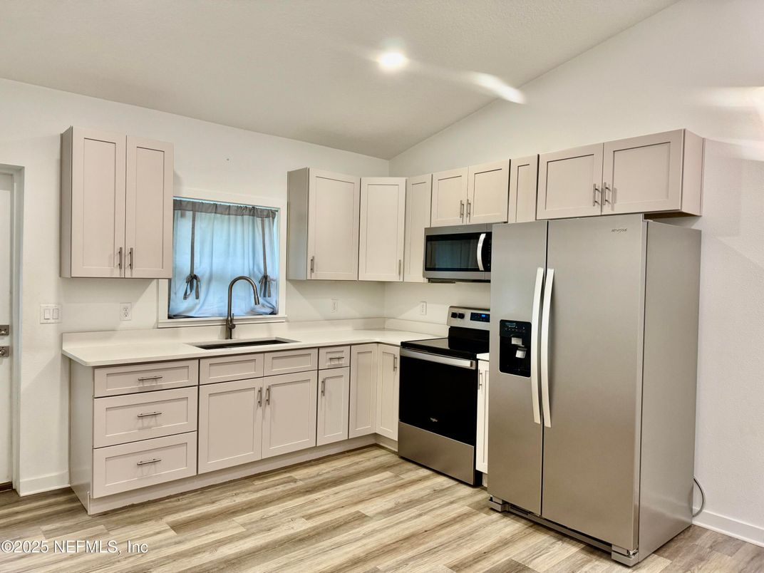 Interior, Kitchen, Recessed Lighting, Stainless Steel Appliances, Wood Texture Flooring
