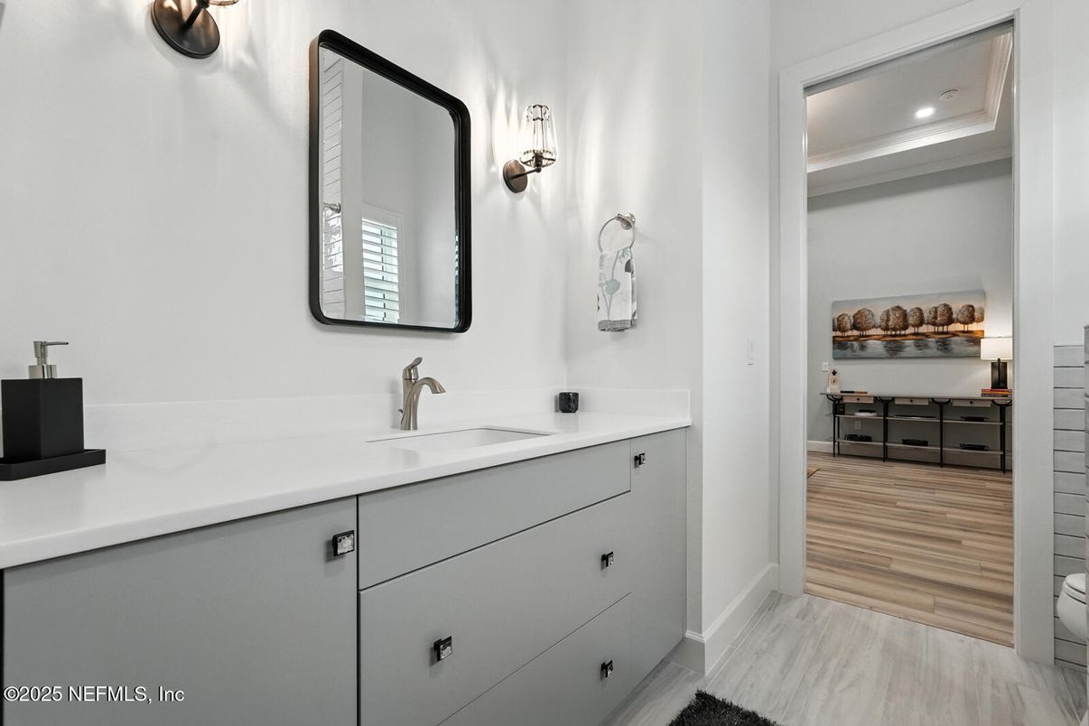 Bathroom, Dual Sink Vanities, Interior, Recessed Lighting, Wood Texture Flooring