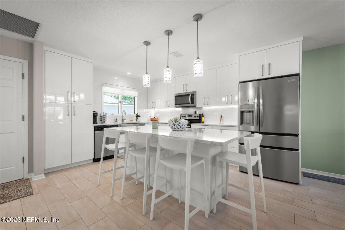 Interior, Kitchen, Pendant Lights, Recessed Lighting, Stainless Steel Appliances, Wood Texture Flooring