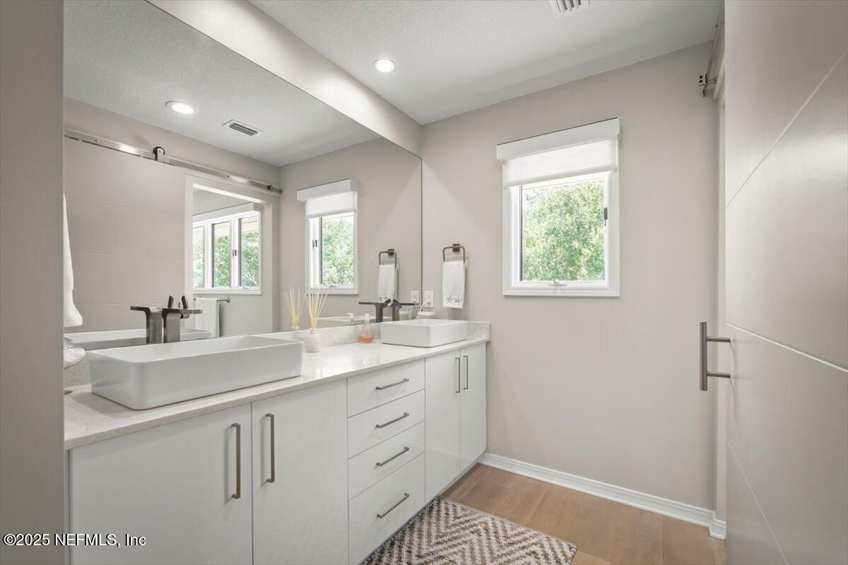 Bathroom, Dual Sink Vanities, Interior, Recessed Lighting, Wood Texture Flooring