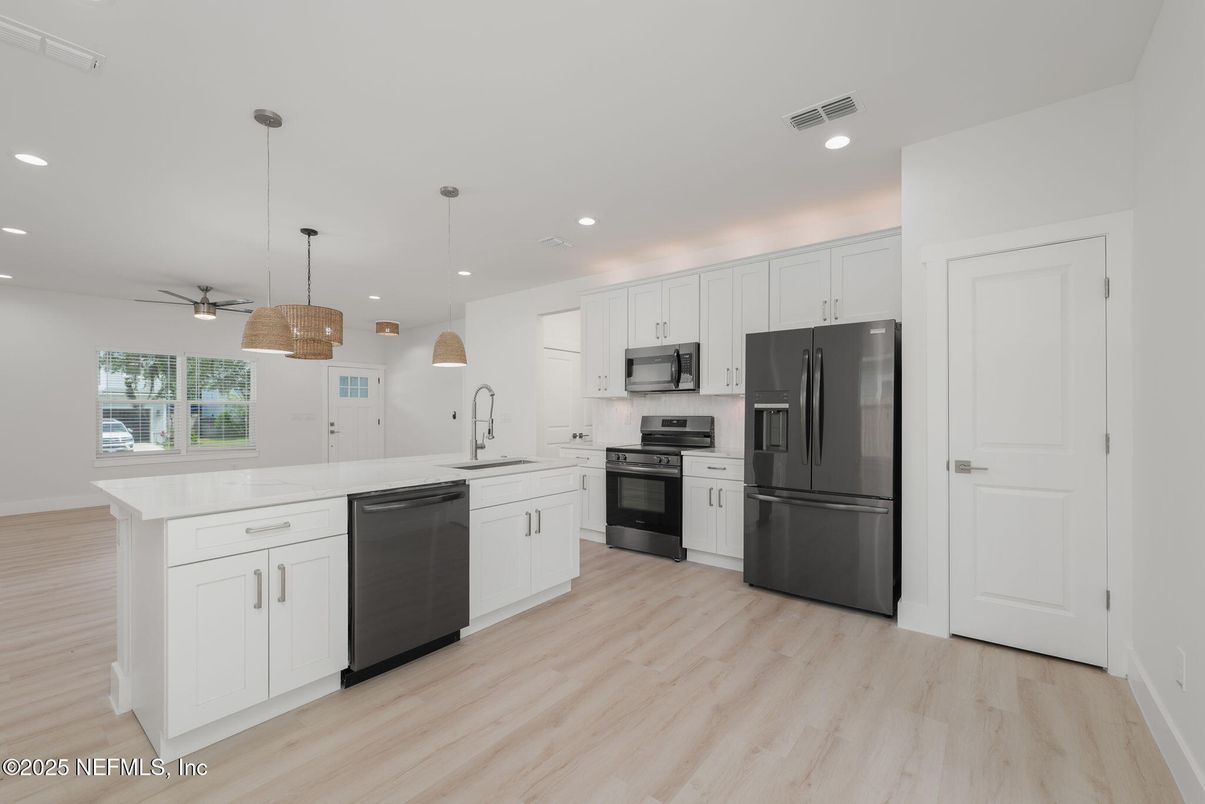 Interior, Kitchen, Pendant Lights, Recessed Lighting, Stainless Steel Appliances, Wood Texture Flooring
