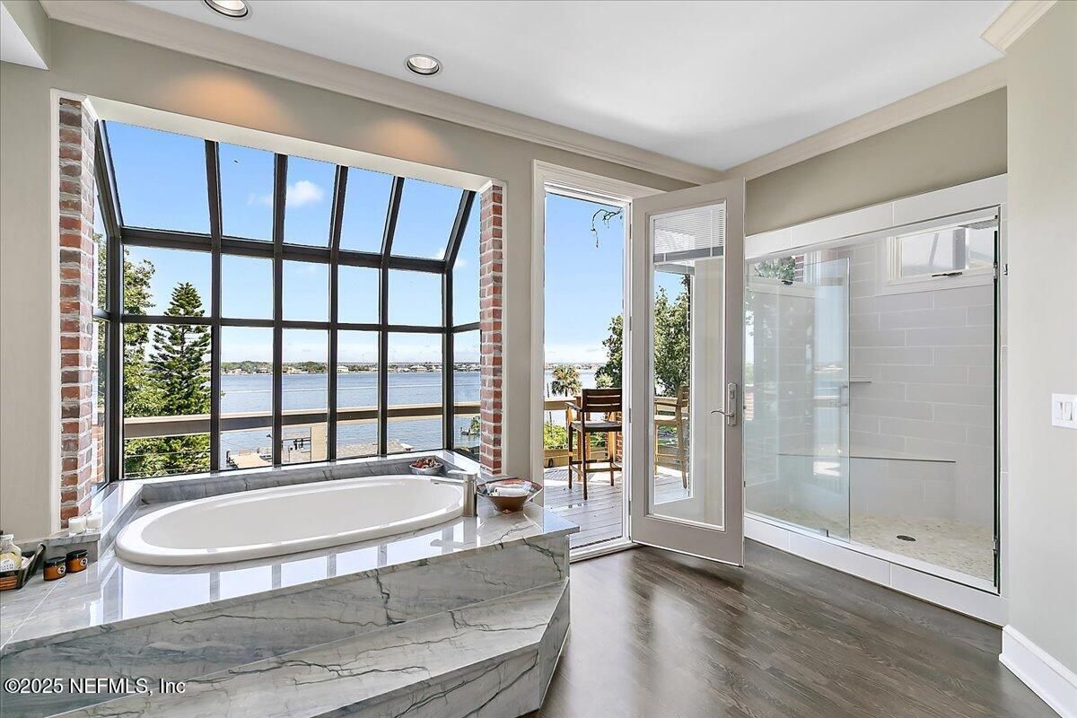 Bathroom, Glass Shower, Interior, Recessed Lighting, Water, Wood Texture Flooring