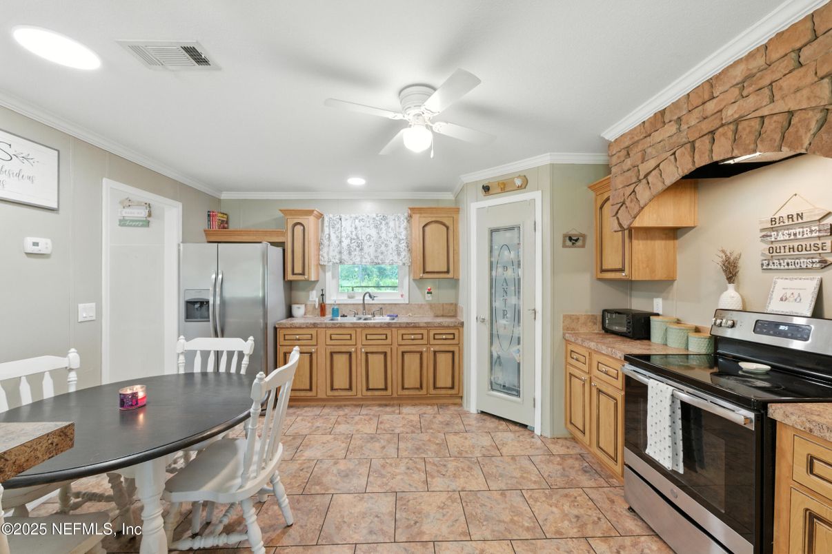 Dining room, Interior, Kitchen, Recessed Lighting, Stainless Steel Appliances, Stone Walls