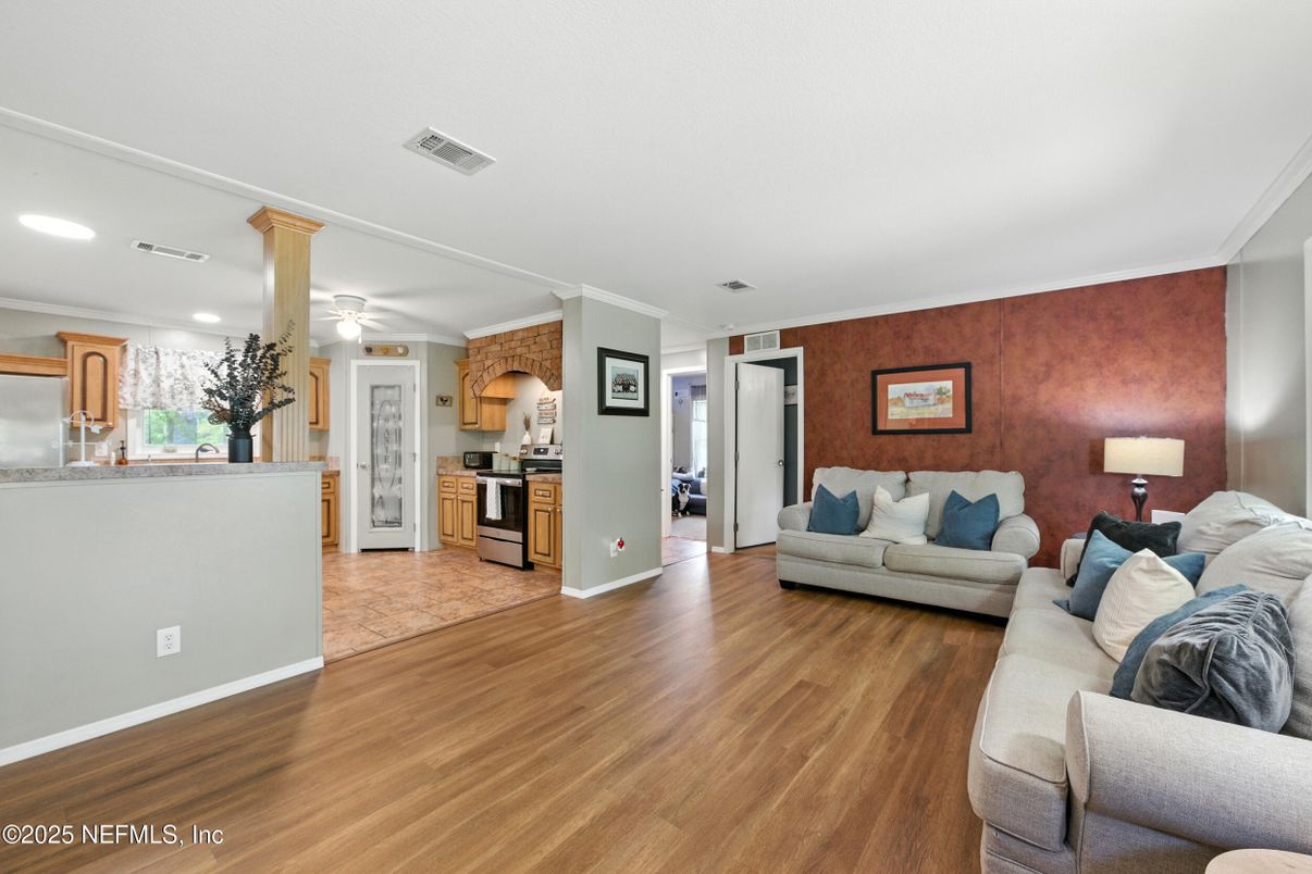 Interior, Kitchen, Living room, Recessed Lighting, Stainless Steel Appliances, Stone Walls, Wood Texture Flooring