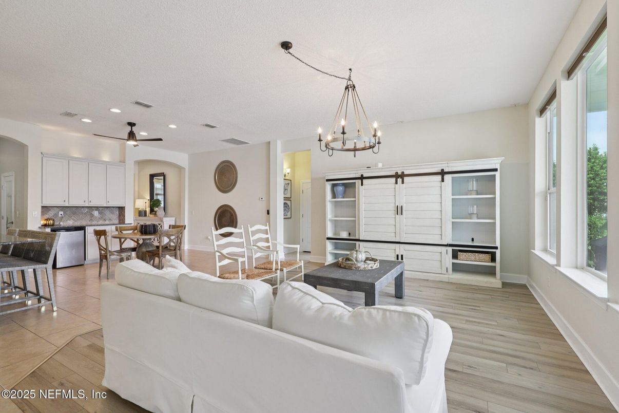 Chandelier, Dining room, Interior, Kitchen, Living room, Pendant Lights, Recessed Lighting, Wood Texture Flooring