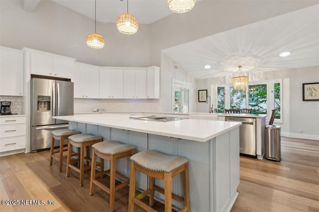 Chandelier, Interior, Kitchen, Pendant Lights, Recessed Lighting, Stainless Steel Appliances, Wood Texture Flooring