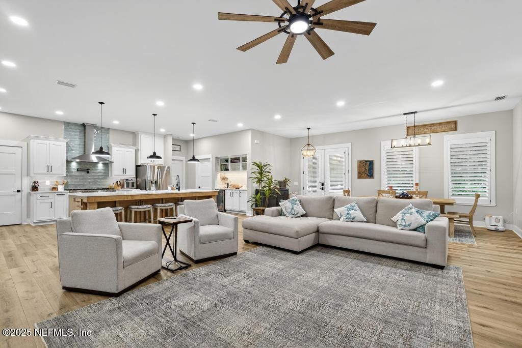 Dining room, Interior, Kitchen, Living room, Pendant Lights, Recessed Lighting, Stainless Steel Appliances, Wood Texture Flooring