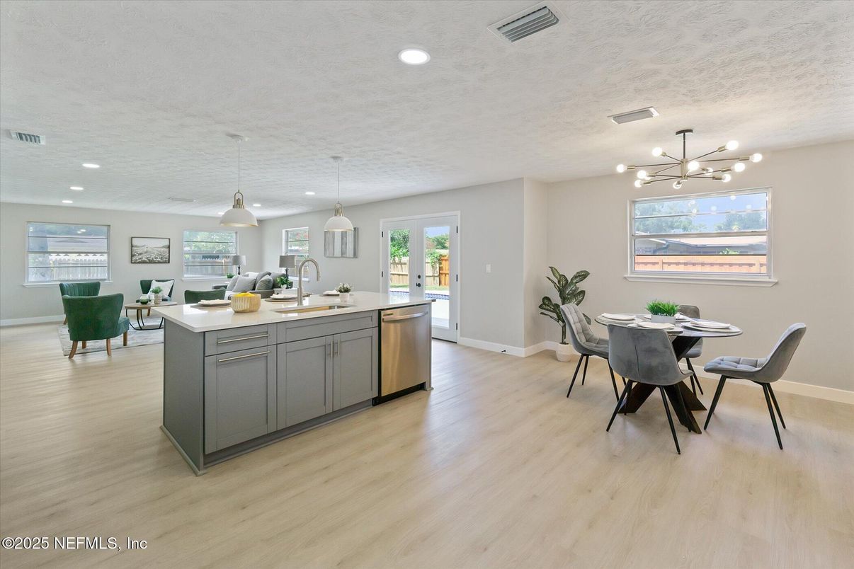 Dining room, Interior, Kitchen, Pendant Lights, Recessed Lighting, Stainless Steel Appliances, Wood Texture Flooring