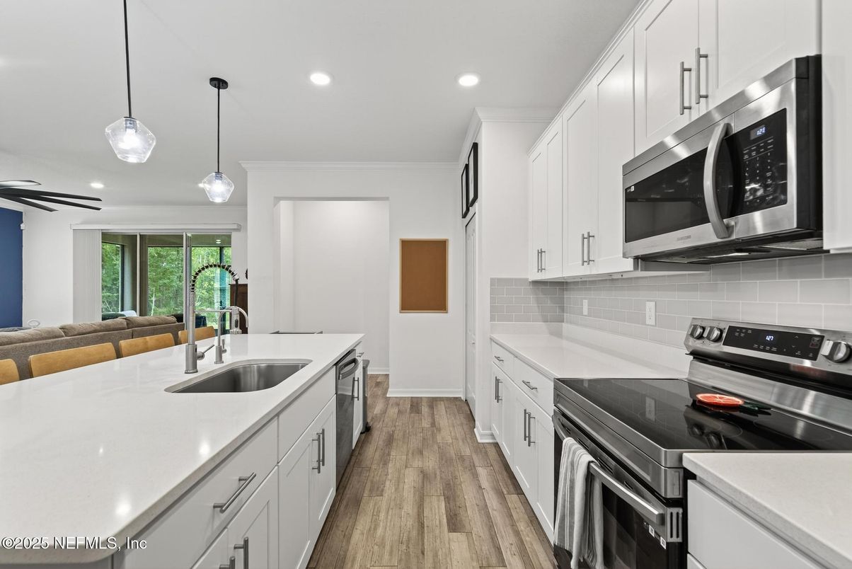 Interior, Kitchen, Pendant Lights, Recessed Lighting, Stainless Steel Appliances, Wood Texture Flooring
