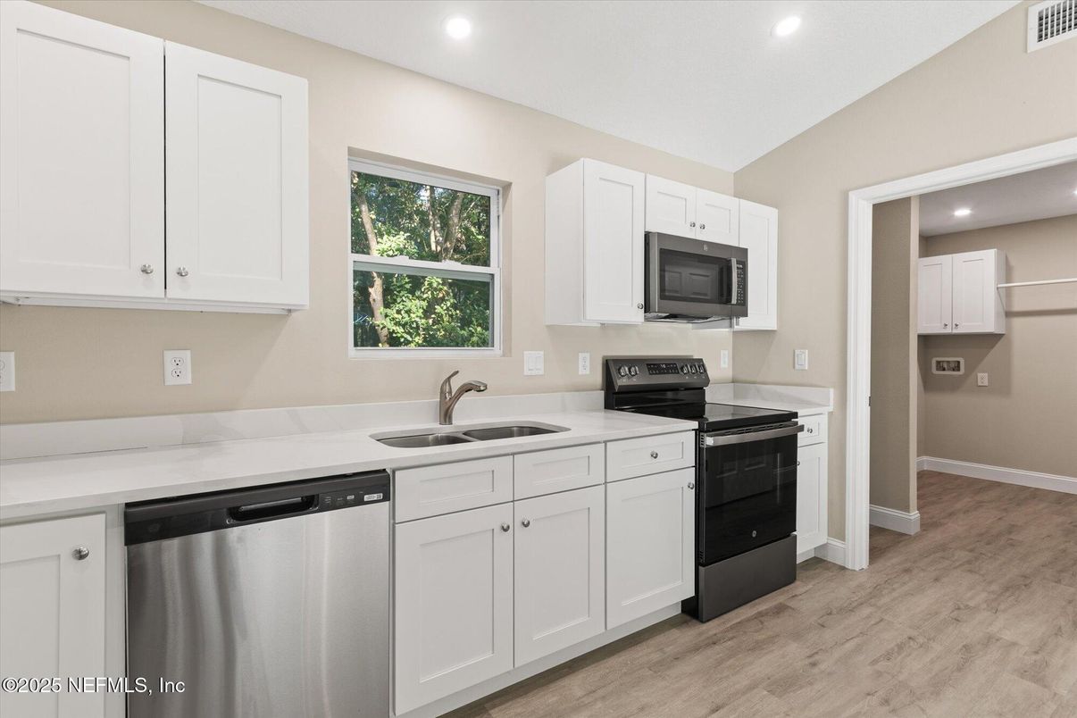 Interior, Kitchen, Recessed Lighting, Stainless Steel Appliances, Wood Texture Flooring