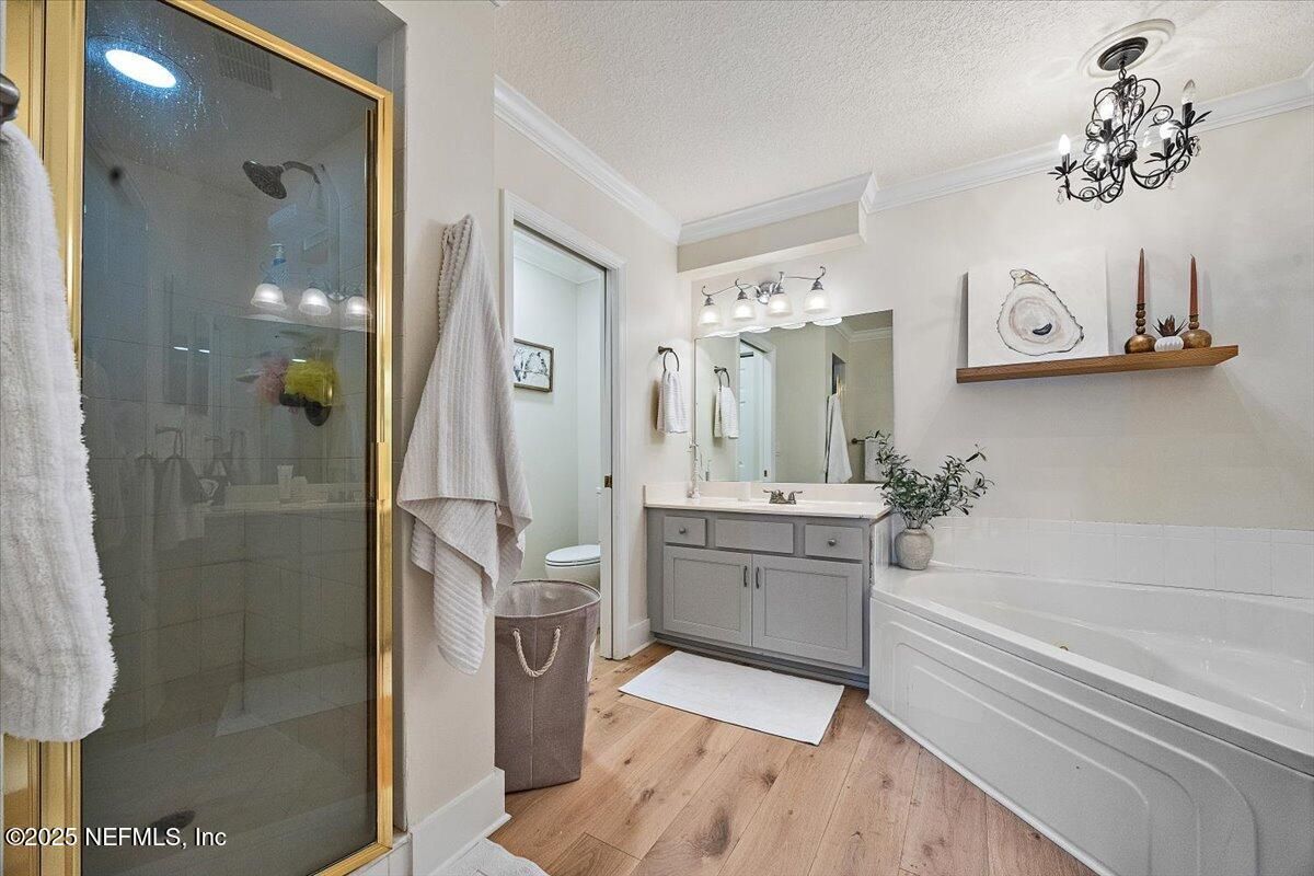 Bathroom, Chandelier, Glass Shower, Interior, Wood Texture Flooring