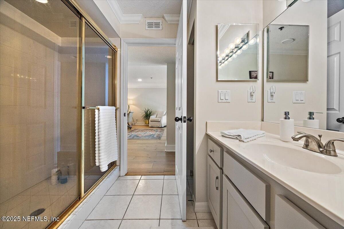 Bathroom, Bedroom, Dual Sink Vanities, Glass Shower, Interior, Recessed Lighting, Wood Texture Flooring