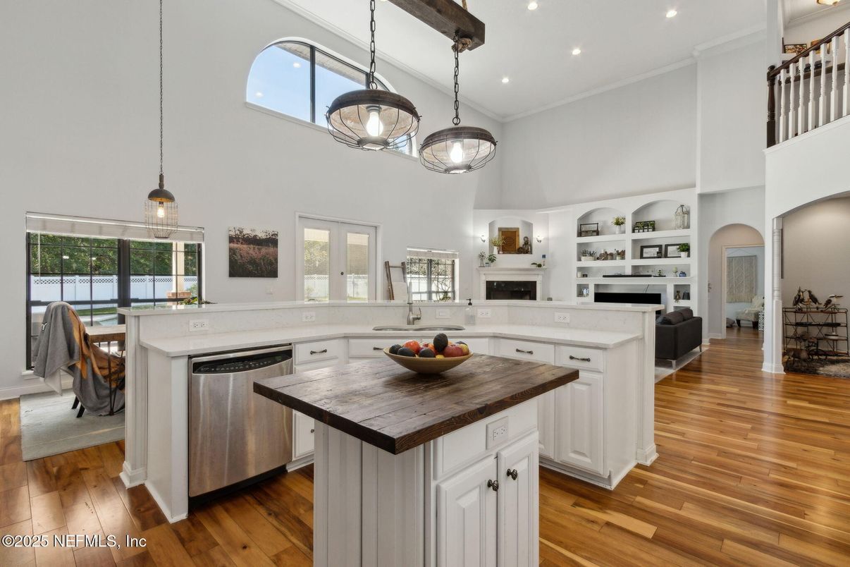 Dining room, Fireplace, Interior, Kitchen, Pendant Lights, Recessed Lighting, Wood Texture Flooring