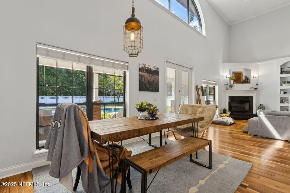 Dining room, Fireplace, Interior, Pendant Lights, Wood Texture Flooring