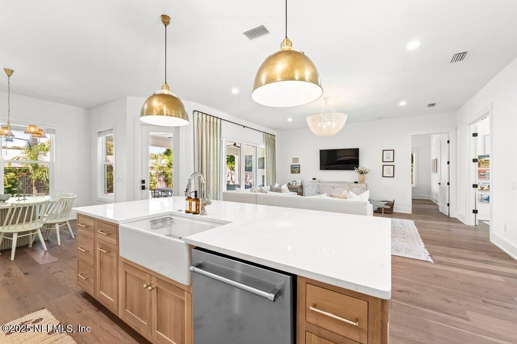 Dining room, Interior, Kitchen, Living room, Pendant Lights, Recessed Lighting, Stainless Steel Appliances, Wood Texture Flooring