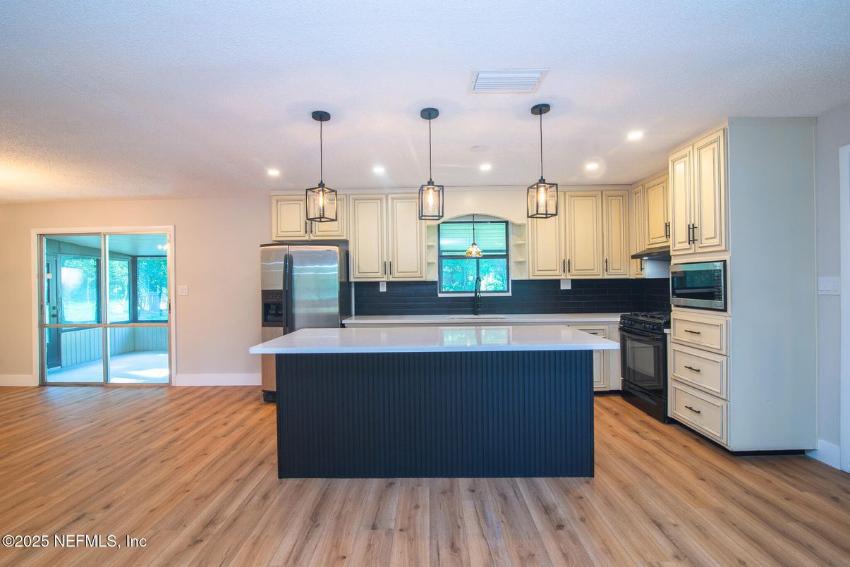 Interior, Kitchen, Pendant Lights, Recessed Lighting, Stainless Steel Appliances, Wood Texture Flooring
