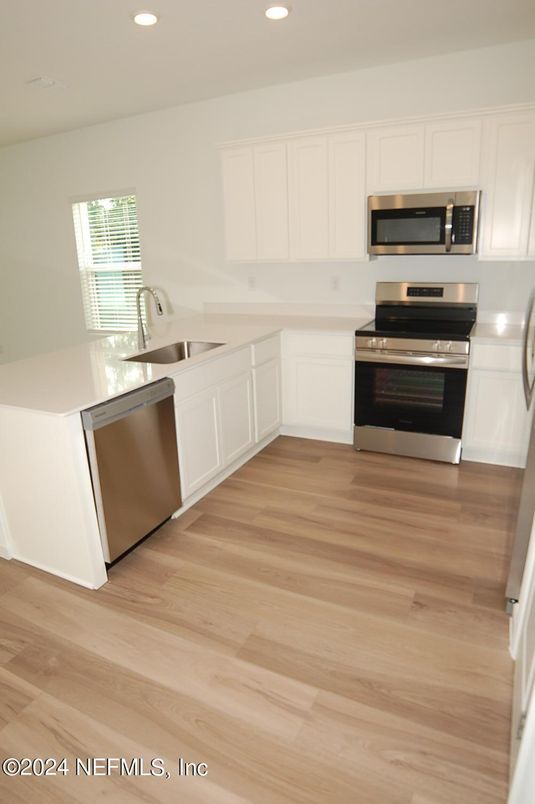 Interior, Kitchen, Recessed Lighting, Stainless Steel Appliances, Wood Texture Flooring