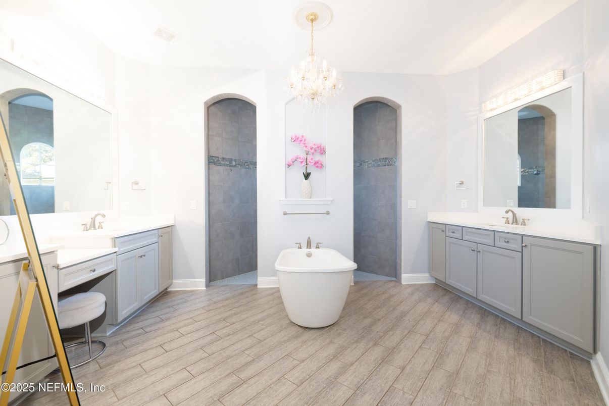 Bathroom, Chandelier, Dual Sink Vanities, Free Standing Baths, Interior, Wood Texture Flooring