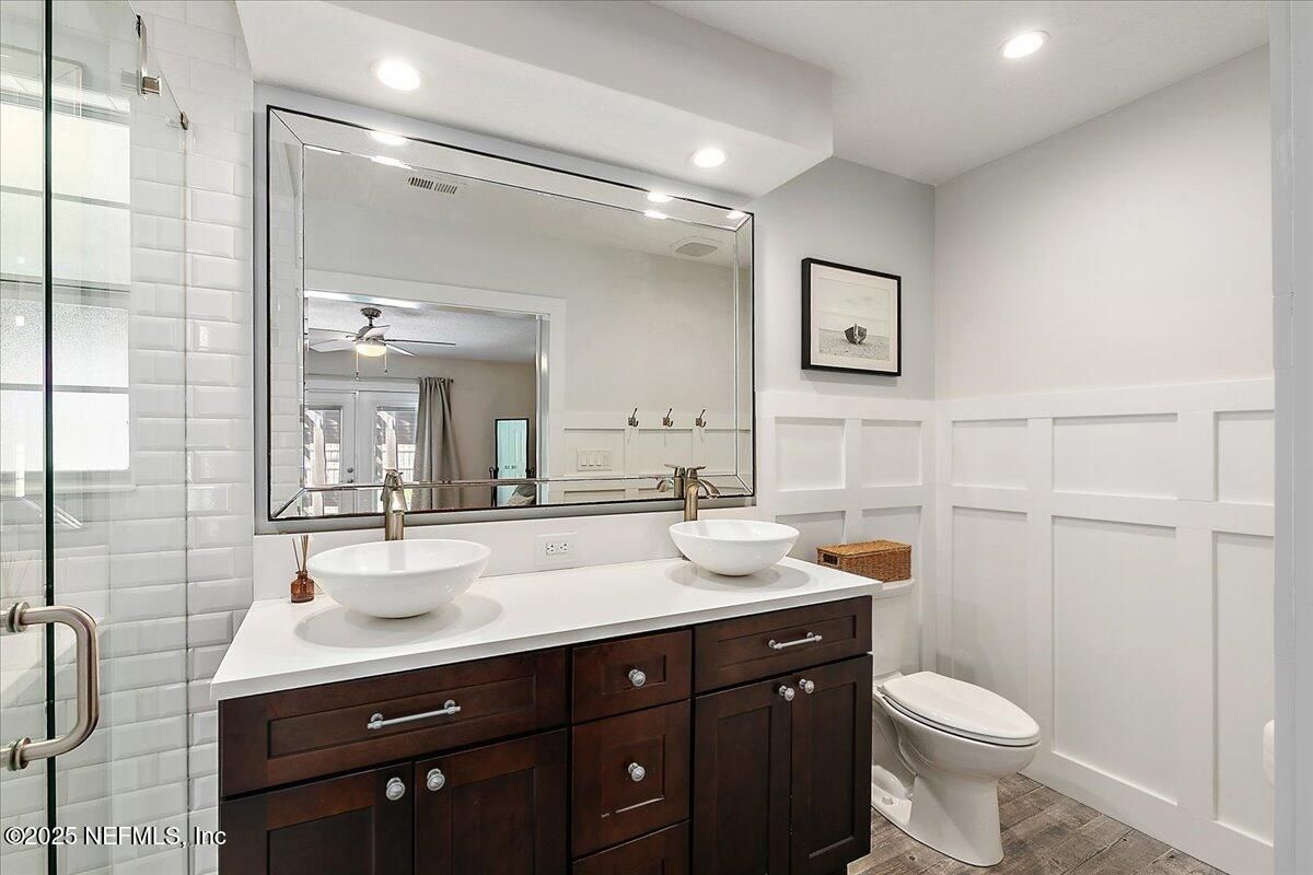 Bathroom, Dual Sink Vanities, Glass Shower, Interior, Recessed Lighting, Wood Texture Flooring