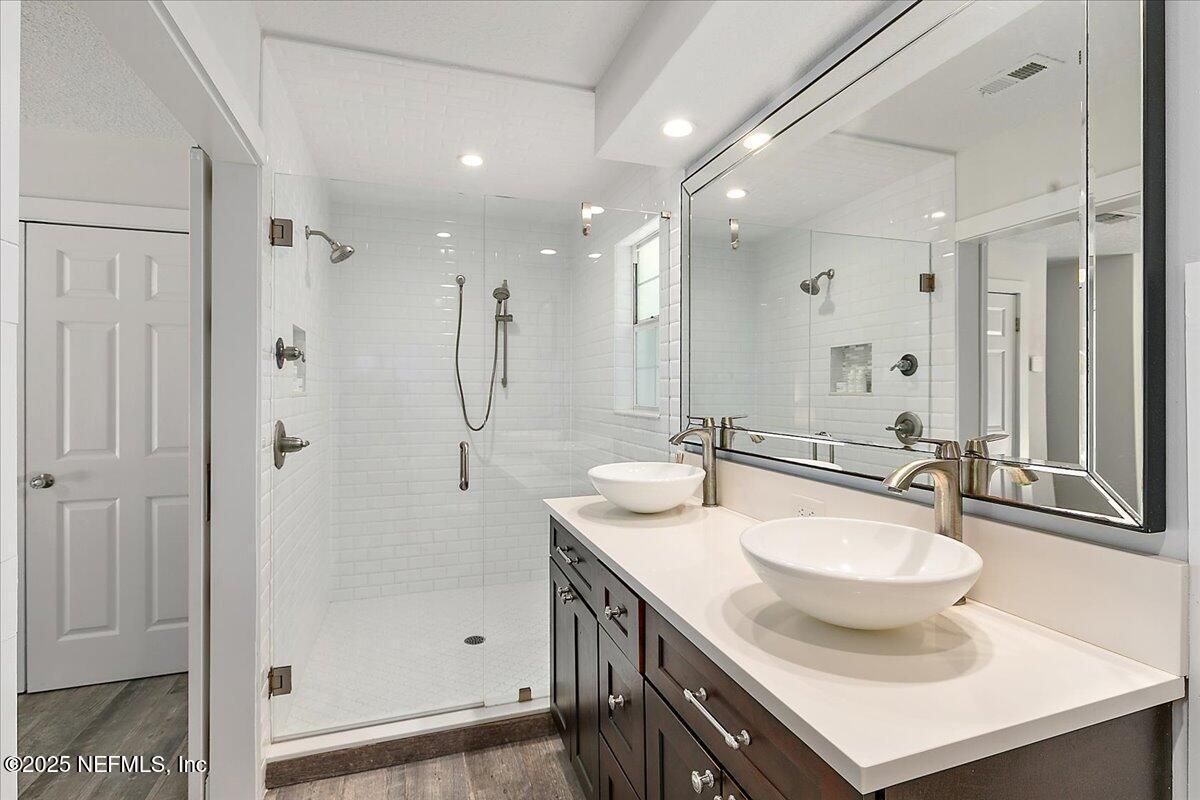 Bathroom, Dual Sink Vanities, Glass Shower, Interior, Recessed Lighting, Wood Texture Flooring