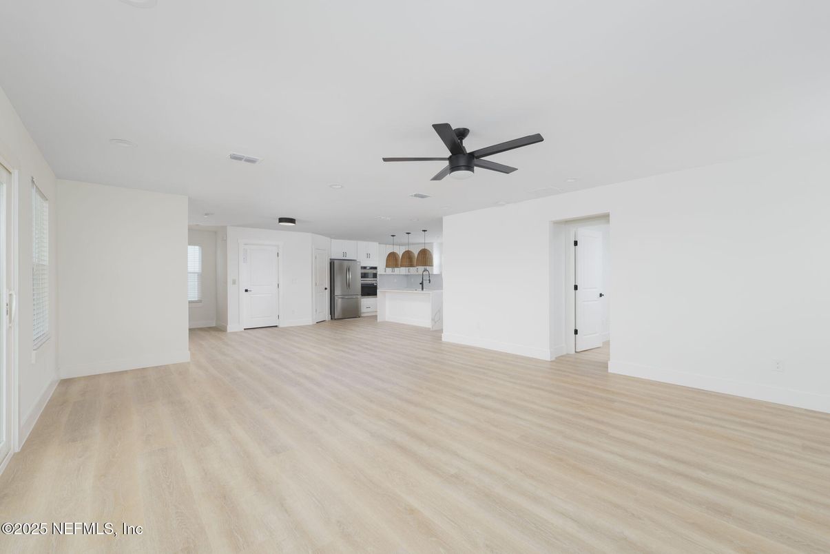 Empty room, Interior, Kitchen, Stainless Steel Appliances, Wood Texture Flooring