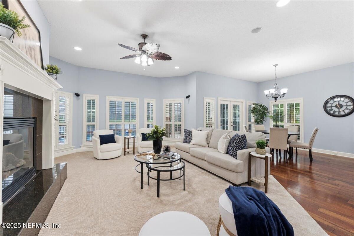 Chandelier, Dining room, Fireplace, Interior, Living room, Recessed Lighting, Wood Texture Flooring