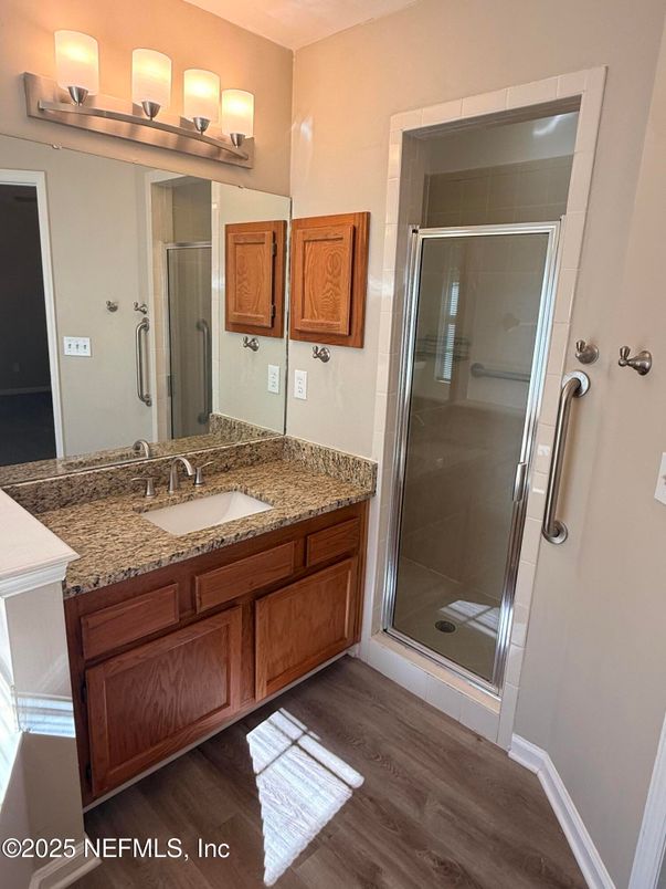 Bathroom, Dual Sink Vanities, Glass Shower, Interior, Wood Texture Flooring