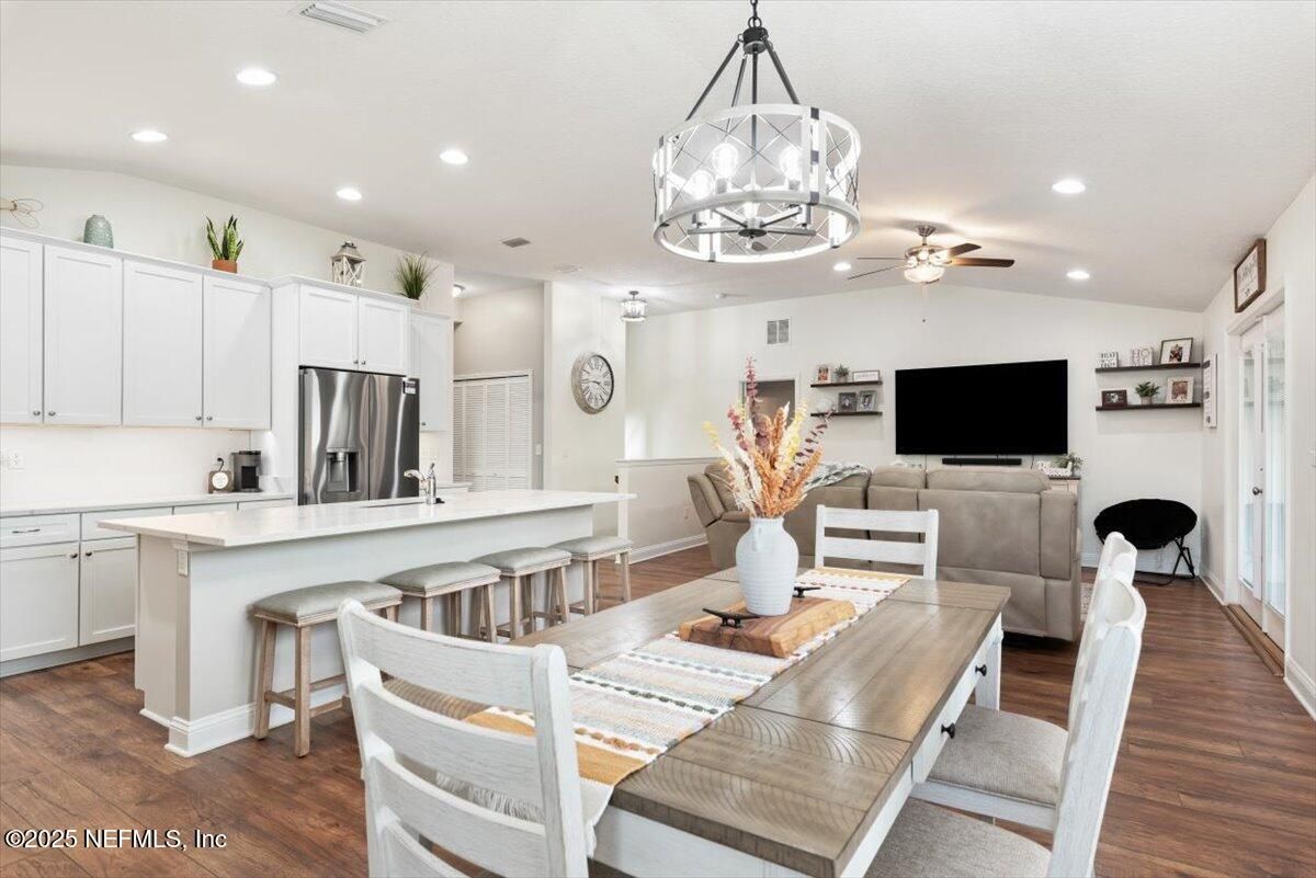 Dining room, Interior, Kitchen, Recessed Lighting, Stainless Steel Appliances, Wood Texture Flooring