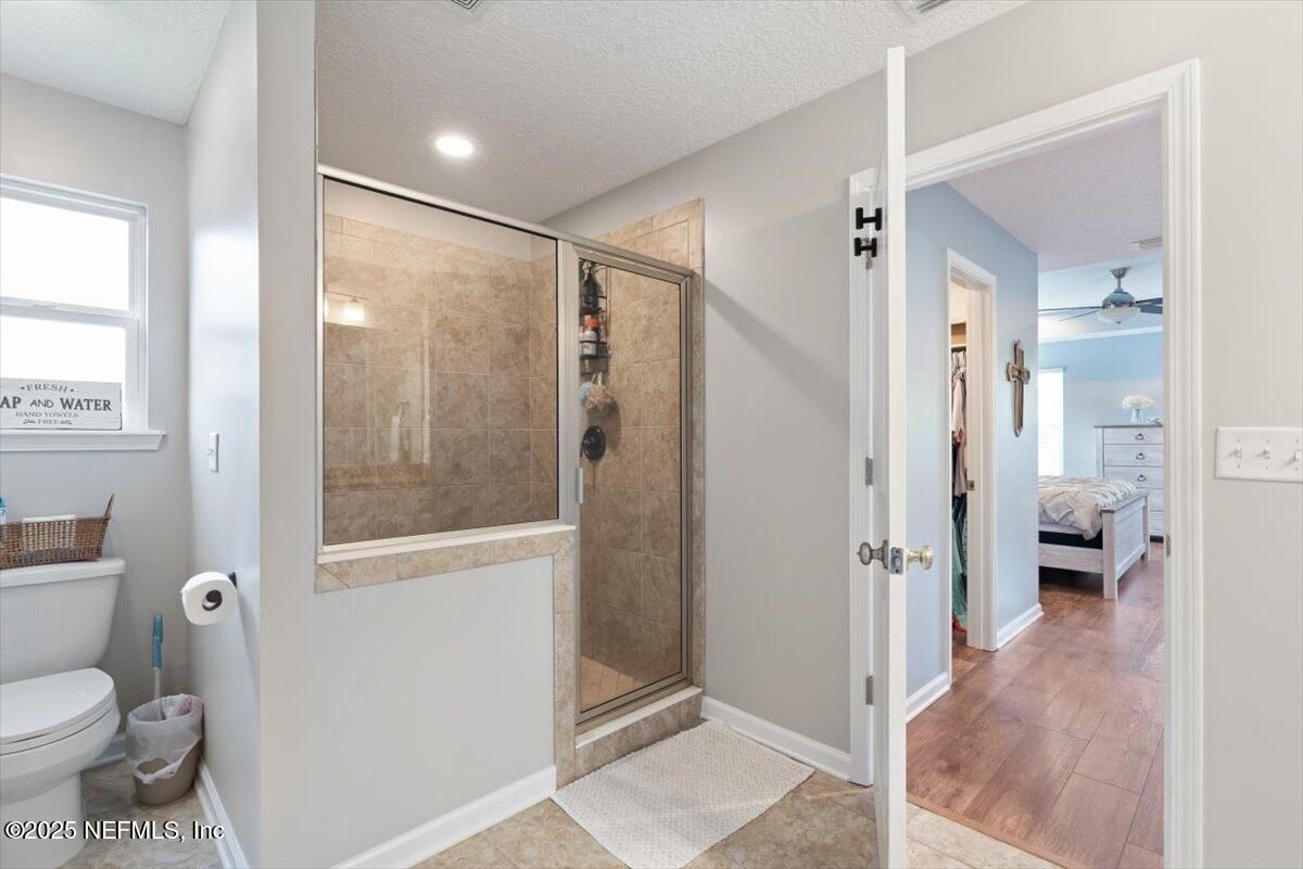 Bathroom, Bedroom, Glass Shower, Interior, Recessed Lighting, Wood Texture Flooring