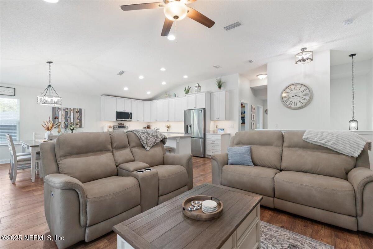 Dining room, Interior, Kitchen, Living room, Pendant Lights, Recessed Lighting, Stainless Steel Appliances, Wood Texture Flooring