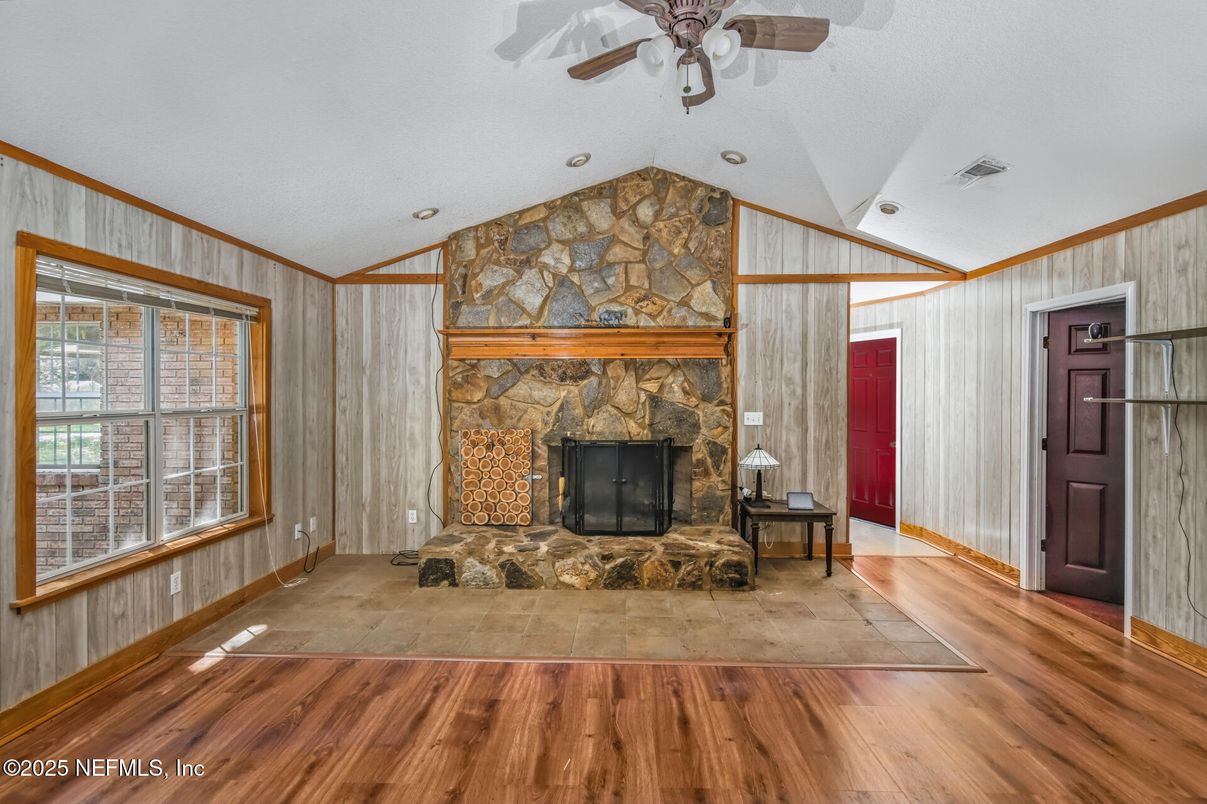Fireplace, Interior, Recessed Lighting, Stone Walls, Wood Texture Flooring