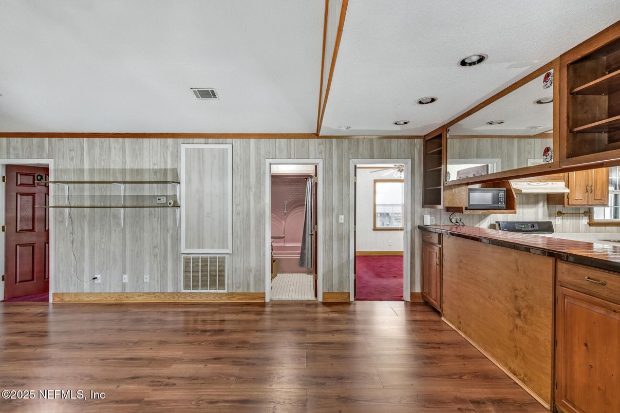 Interior, Kitchen, Recessed Lighting, Tile Countertops, Wood Texture Flooring
