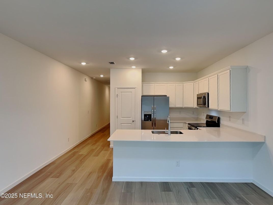 Interior, Kitchen, Recessed Lighting, Stainless Steel Appliances, Wood Texture Flooring