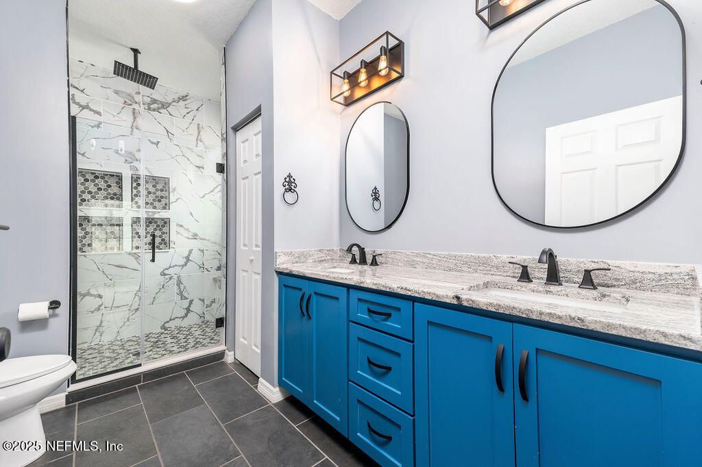 Bathroom, Dual Sink Vanities, Glass Shower, Interior, Marble Walls