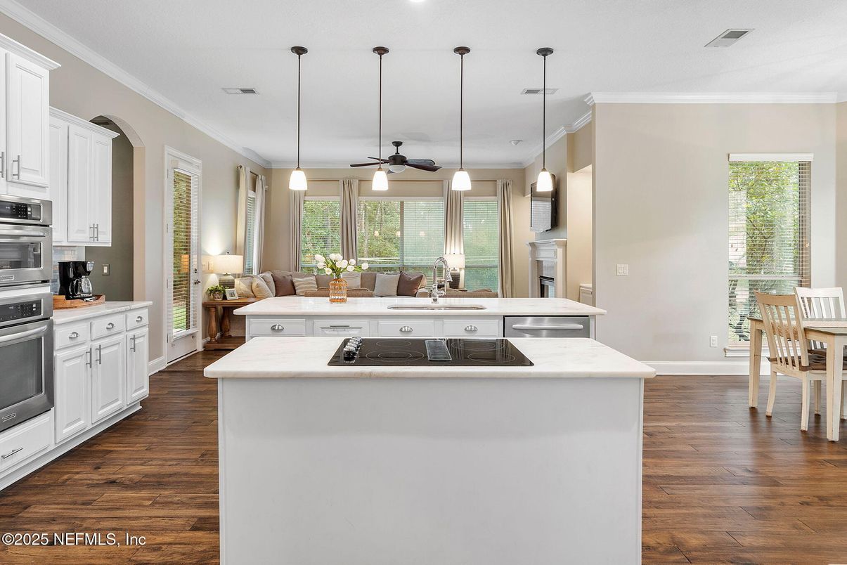 Dining room, Interior, Kitchen, Pendant Lights, Recessed Lighting, Stainless Steel Appliances, Wood Texture Flooring