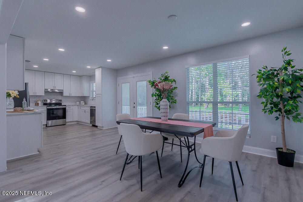 Dining room, Interior, Kitchen, Recessed Lighting, Stainless Steel Appliances, Wood Texture Flooring