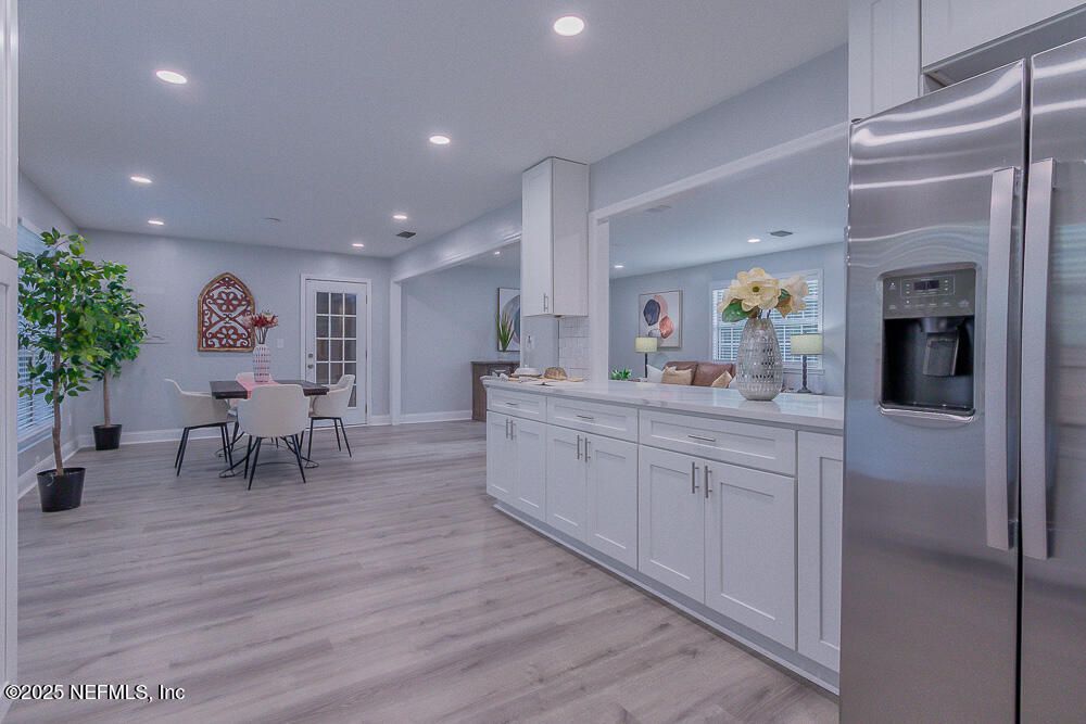 Dining room, Interior, Kitchen, Recessed Lighting, Stainless Steel Appliances, Wood Texture Flooring
